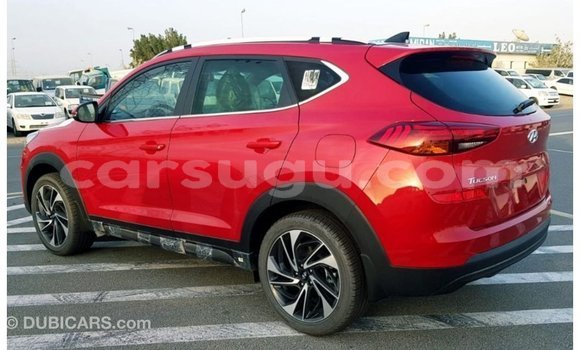 Sayi Imported Hyundai Tucson Red Mota in Import - Dubai a Burkina Faso Sayi Imported Hyundai Tucson Red Mota in Import - Dubai a Burkina Faso