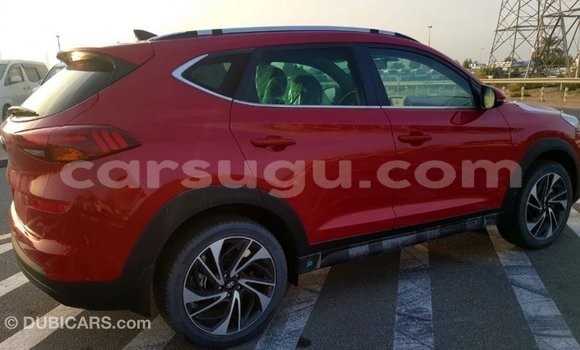 Sayi Imported Hyundai Tucson Red Mota in Import - Dubai a Burkina Faso Sayi Imported Hyundai Tucson Red Mota in Import - Dubai a Burkina Faso