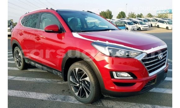 Sayi Imported Hyundai Tucson Red Mota in Import - Dubai a Burkina Faso Sayi Imported Hyundai Tucson Red Mota in Import - Dubai a Burkina Faso