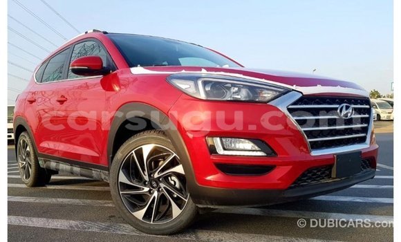 Sayi Imported Hyundai Tucson Red Mota in Import - Dubai a Burkina Faso Sayi Imported Hyundai Tucson Red Mota in Import - Dubai a Burkina Faso