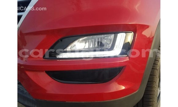 Sayi Imported Hyundai Tucson Red Mota in Import - Dubai a Burkina Faso Sayi Imported Hyundai Tucson Red Mota in Import - Dubai a Burkina Faso