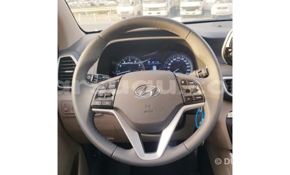 Sayi Imported Hyundai Tucson Red Mota in Import - Dubai a Burkina Faso Sayi Imported Hyundai Tucson Red Mota in Import - Dubai a Burkina Faso