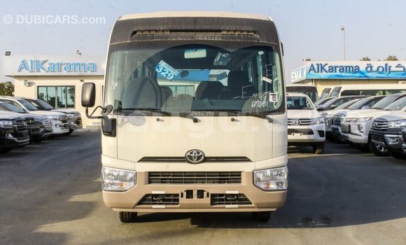 Acheter Import Voiture Toyota Coaster Blanc à Import - Dubai, Burkina-Faso Acheter Import Voiture Toyota Coaster Blanc à Import - Dubai, Burkina-Faso