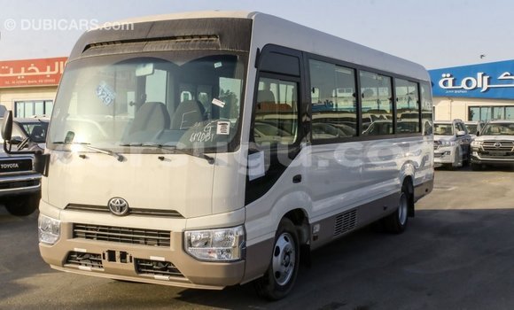 Acheter Import Voiture Toyota Coaster Blanc à Import - Dubai, Burkina-Faso Acheter Import Voiture Toyota Coaster Blanc à Import - Dubai, Burkina-Faso