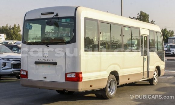 Acheter Import Voiture Toyota Coaster Blanc à Import - Dubai, Burkina-Faso Acheter Import Voiture Toyota Coaster Blanc à Import - Dubai, Burkina-Faso