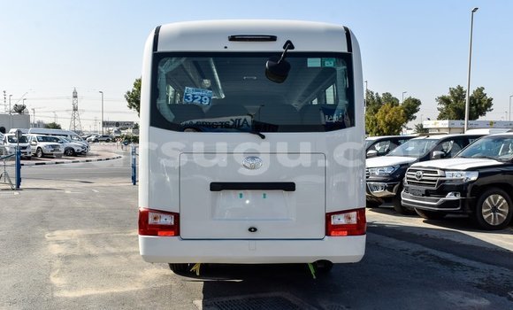 Acheter Import Voiture Toyota Coaster Blanc à Import - Dubai, Burkina-Faso Acheter Import Voiture Toyota Coaster Blanc à Import - Dubai, Burkina-Faso