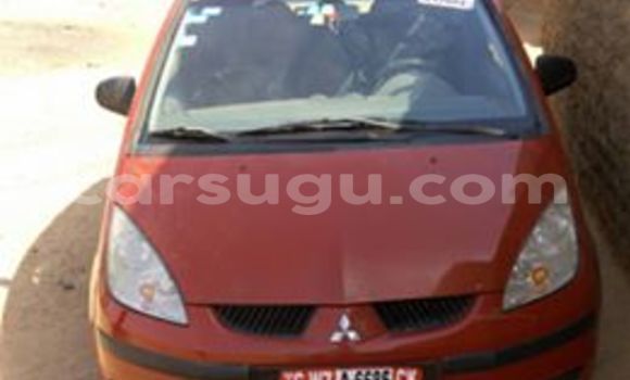 Sayi Sabo Mitsubishi Colt Red Mota in Ouagadougou a Burkina Faso