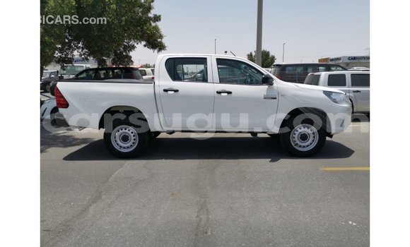 Buy Import Toyota Hilux White Car in Import - Dubai in Burkina Faso Buy Import Toyota Hilux White Car in Import - Dubai in Burkina Faso