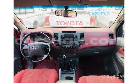 Sayi Imported Toyota Hilux Red Mota in Import - Dubai a Burkina Faso Sayi Imported Toyota Hilux Red Mota in Import - Dubai a Burkina Faso