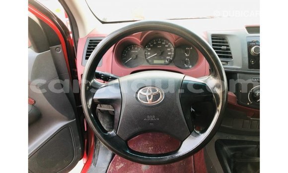 Sayi Imported Toyota Hilux Red Mota in Import - Dubai a Burkina Faso Sayi Imported Toyota Hilux Red Mota in Import - Dubai a Burkina Faso
