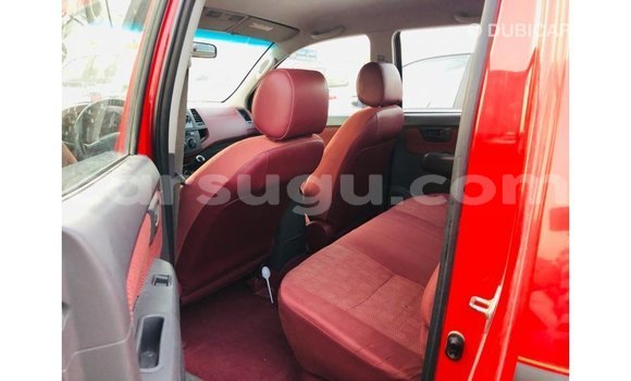 Sayi Imported Toyota Hilux Red Mota in Import - Dubai a Burkina Faso Sayi Imported Toyota Hilux Red Mota in Import - Dubai a Burkina Faso