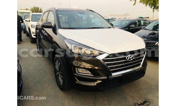 Sayi Imported Hyundai Tucson Brown Mota in Import - Dubai a Burkina Faso Sayi Imported Hyundai Tucson Brown Mota in Import - Dubai a Burkina Faso