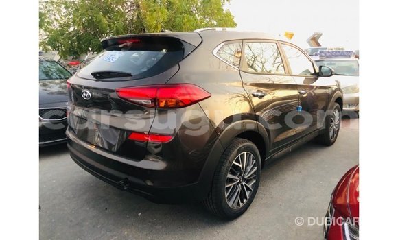 Sayi Imported Hyundai Tucson Brown Mota in Import - Dubai a Burkina Faso Sayi Imported Hyundai Tucson Brown Mota in Import - Dubai a Burkina Faso