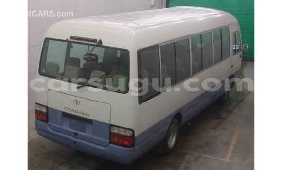 Acheter Import Voiture Toyota Coaster Blanc à Import - Dubai, Burkina-Faso Acheter Import Voiture Toyota Coaster Blanc à Import - Dubai, Burkina-Faso