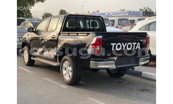 Sayi Imported Toyota Hilux Black Mota in Import - Dubai a Burkina Faso Sayi Imported Toyota Hilux Black Mota in Import - Dubai a Burkina Faso