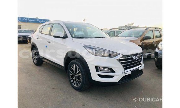 Sayi Imported Hyundai Tucson White Mota in Import - Dubai a Burkina Faso Sayi Imported Hyundai Tucson White Mota in Import - Dubai a Burkina Faso