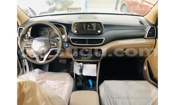 Sayi Imported Hyundai Tucson White Mota in Import - Dubai a Burkina Faso Sayi Imported Hyundai Tucson White Mota in Import - Dubai a Burkina Faso
