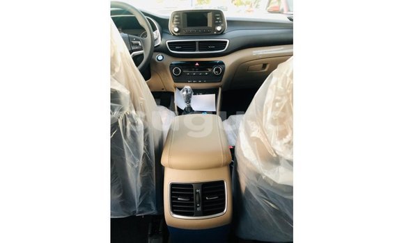 Sayi Imported Hyundai Tucson White Mota in Import - Dubai a Burkina Faso Sayi Imported Hyundai Tucson White Mota in Import - Dubai a Burkina Faso