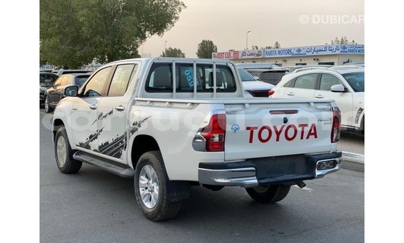 Sayi Imported Toyota Hilux White Mota in Import - Dubai a Burkina Faso Sayi Imported Toyota Hilux White Mota in Import - Dubai a Burkina Faso