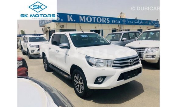 Sayi Imported Toyota Hilux White Mota in Import - Dubai a Burkina Faso Sayi Imported Toyota Hilux White Mota in Import - Dubai a Burkina Faso