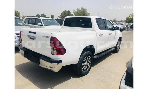 Sayi Imported Toyota Hilux White Mota in Import - Dubai a Burkina Faso Sayi Imported Toyota Hilux White Mota in Import - Dubai a Burkina Faso