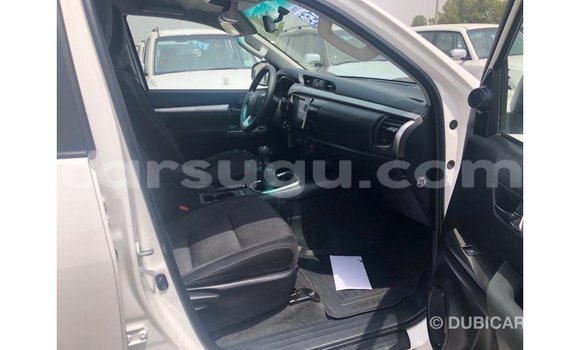 Sayi Imported Toyota Hilux White Mota in Import - Dubai a Burkina Faso Sayi Imported Toyota Hilux White Mota in Import - Dubai a Burkina Faso