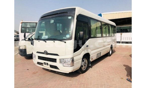 Sayi Imported Toyota Coaster White Mota in Import - Dubai a Burkina Faso Sayi Imported Toyota Coaster White Mota in Import - Dubai a Burkina Faso