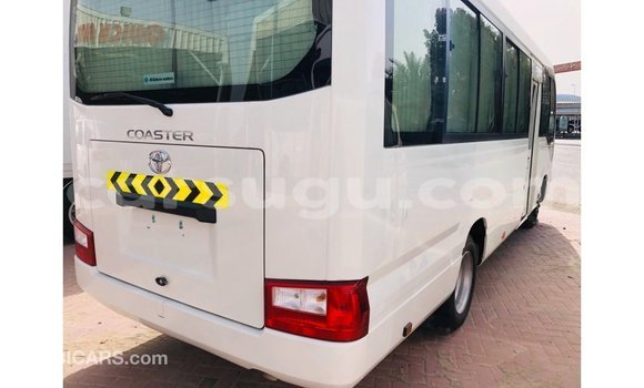 Sayi Imported Toyota Coaster White Mota in Import - Dubai a Burkina Faso Sayi Imported Toyota Coaster White Mota in Import - Dubai a Burkina Faso