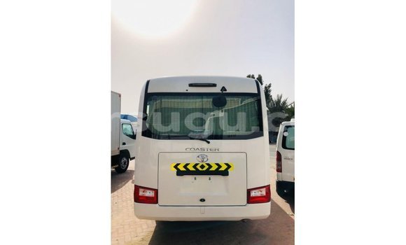 Sayi Imported Toyota Coaster White Mota in Import - Dubai a Burkina Faso Sayi Imported Toyota Coaster White Mota in Import - Dubai a Burkina Faso