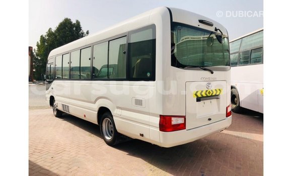 Sayi Imported Toyota Coaster White Mota in Import - Dubai a Burkina Faso Sayi Imported Toyota Coaster White Mota in Import - Dubai a Burkina Faso