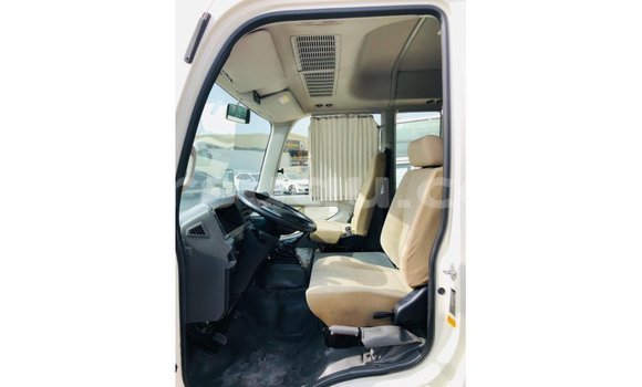 Sayi Imported Toyota Coaster White Mota in Import - Dubai a Burkina Faso Sayi Imported Toyota Coaster White Mota in Import - Dubai a Burkina Faso