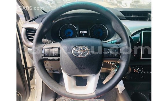 Sayi Imported Toyota Hilux White Mota in Import - Dubai a Burkina Faso Sayi Imported Toyota Hilux White Mota in Import - Dubai a Burkina Faso