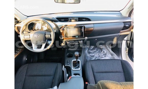 Sayi Imported Toyota Hilux White Mota in Import - Dubai a Burkina Faso Sayi Imported Toyota Hilux White Mota in Import - Dubai a Burkina Faso