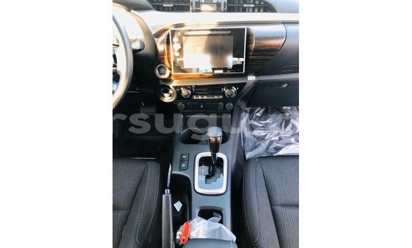 Sayi Imported Toyota Hilux White Mota in Import - Dubai a Burkina Faso Sayi Imported Toyota Hilux White Mota in Import - Dubai a Burkina Faso