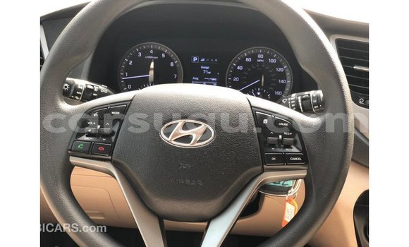Sayi Imported Hyundai Tucson Red Mota in Import - Dubai a Burkina Faso Sayi Imported Hyundai Tucson Red Mota in Import - Dubai a Burkina Faso