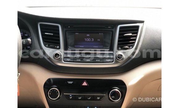 Sayi Imported Hyundai Tucson Red Mota in Import - Dubai a Burkina Faso Sayi Imported Hyundai Tucson Red Mota in Import - Dubai a Burkina Faso