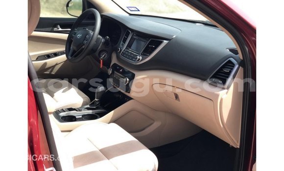Sayi Imported Hyundai Tucson Red Mota in Import - Dubai a Burkina Faso Sayi Imported Hyundai Tucson Red Mota in Import - Dubai a Burkina Faso