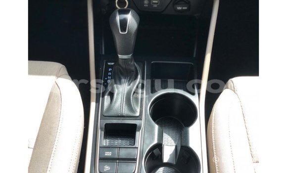 Sayi Imported Hyundai Tucson Red Mota in Import - Dubai a Burkina Faso Sayi Imported Hyundai Tucson Red Mota in Import - Dubai a Burkina Faso