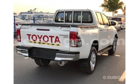 Sayi Imported Toyota Hilux White Mota in Import - Dubai a Burkina Faso Sayi Imported Toyota Hilux White Mota in Import - Dubai a Burkina Faso