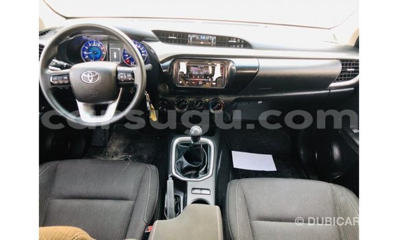 Sayi Imported Toyota Hilux White Mota in Import - Dubai a Burkina Faso Sayi Imported Toyota Hilux White Mota in Import - Dubai a Burkina Faso