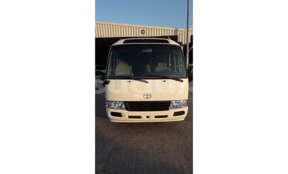 Sayi Imported Toyota Coaster White Mota in Import - Dubai a Burkina Faso