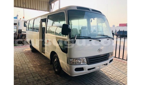 Sayi Imported Toyota Coaster White Mota in Import - Dubai a Burkina Faso