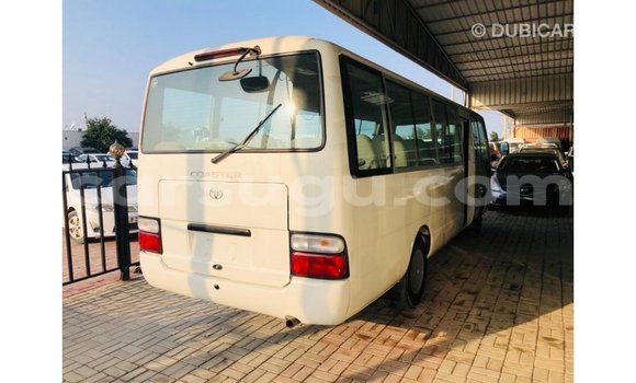 Sayi Imported Toyota Coaster White Mota in Import - Dubai a Burkina Faso Sayi Imported Toyota Coaster White Mota in Import - Dubai a Burkina Faso