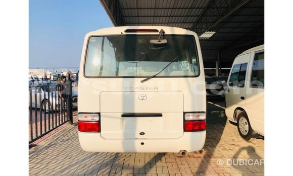 Sayi Imported Toyota Coaster White Mota in Import - Dubai a Burkina Faso Sayi Imported Toyota Coaster White Mota in Import - Dubai a Burkina Faso