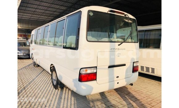 Sayi Imported Toyota Coaster White Mota in Import - Dubai a Burkina Faso Sayi Imported Toyota Coaster White Mota in Import - Dubai a Burkina Faso