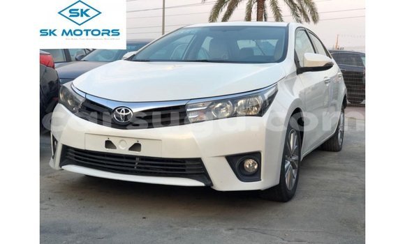 Sayi Imported Toyota Corolla White Mota in Import - Dubai a Burkina Faso Sayi Imported Toyota Corolla White Mota in Import - Dubai a Burkina Faso