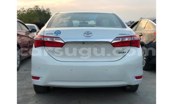 Sayi Imported Toyota Corolla White Mota in Import - Dubai a Burkina Faso Sayi Imported Toyota Corolla White Mota in Import - Dubai a Burkina Faso