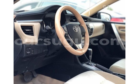Sayi Imported Toyota Corolla White Mota in Import - Dubai a Burkina Faso Sayi Imported Toyota Corolla White Mota in Import - Dubai a Burkina Faso