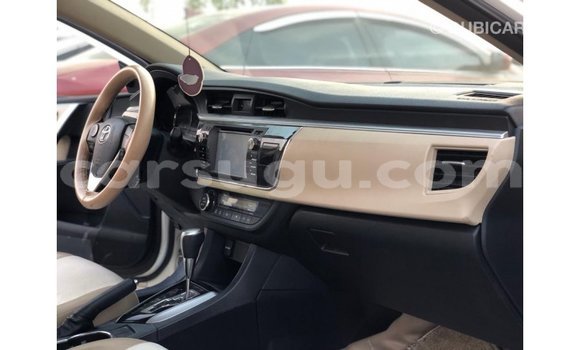Sayi Imported Toyota Corolla White Mota in Import - Dubai a Burkina Faso Sayi Imported Toyota Corolla White Mota in Import - Dubai a Burkina Faso