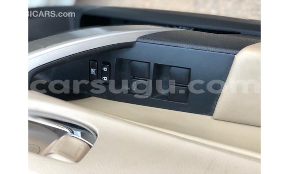 Sayi Imported Toyota Corolla White Mota in Import - Dubai a Burkina Faso Sayi Imported Toyota Corolla White Mota in Import - Dubai a Burkina Faso